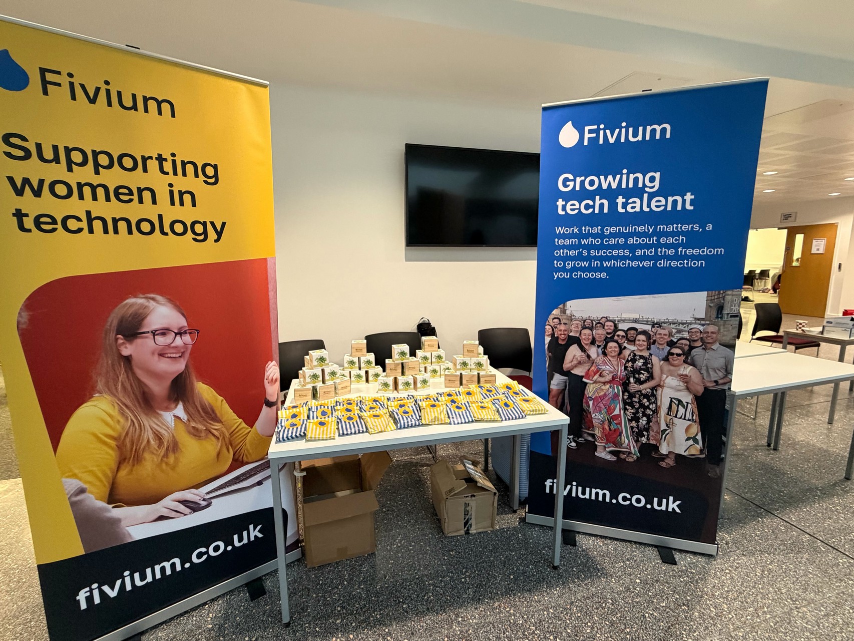 Fivium banners alongside merchandise giveaways
